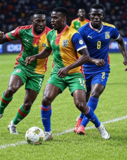 Action shot of Burkina Faso and Central African Republic players competing in the CAF African Nations Championship match